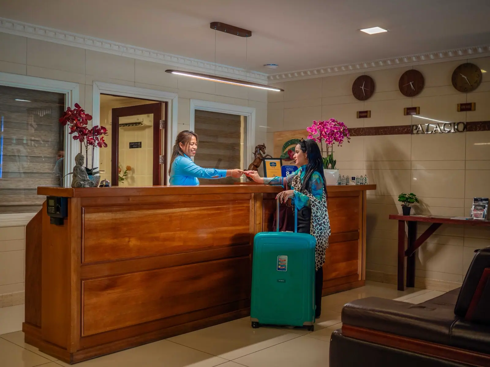 Front desk staff at Hotel Palacio reception